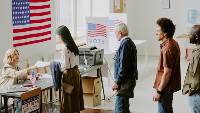 Citizens Standing In Line At Voting Station