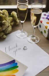 close-up-photo-of-two-glasses-with-champagne-LZWUV2G-scaled.jpg